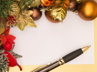 Blank white christmas card with decorations and pen, top view, flat lay