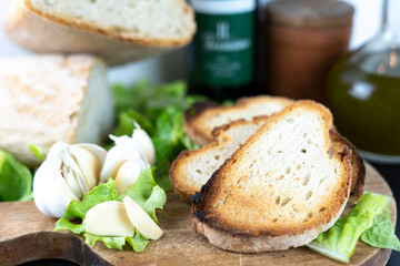 Bread food display for fettunta with oil garlic an tuscan bread elegant display