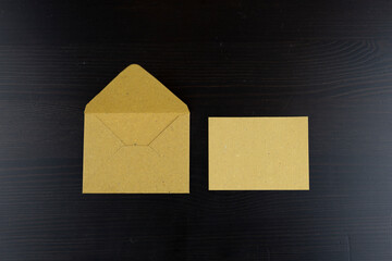 Little brown paper envelope with card for mockup use