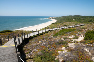 Fototapeta na wymiar Paredes Panoramic Boardwalk. The beach on the Atlantic Ocean between Polvoeiro and Paredes, Portugal, Europe
