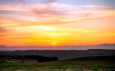 Fototapeta premium sunset over the field