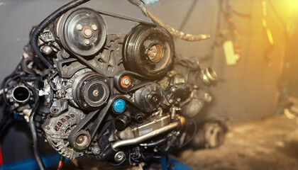 car engine repair, replacement of drive belts and rollers. Dismantled motor.