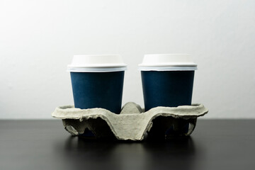 Two blue cafe cups