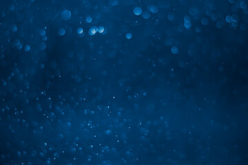 blue glitter vintage lights background. blue bokeh background