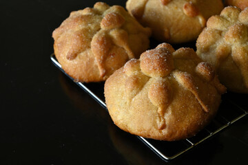 horizontal close-up of traditional pan de muerto