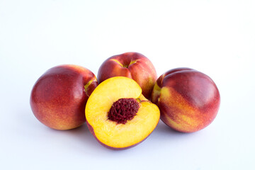 Close-up on ripe nectarine  on the white background