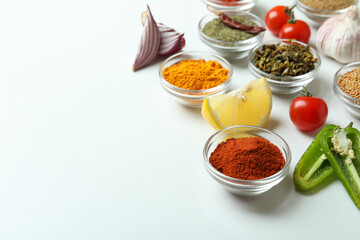 Concept of aromatic spices on white background