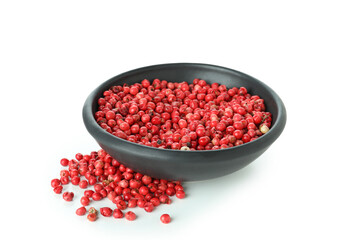 Black bowl of red peppercorns isolated on white background