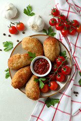 Concept of tasty food with cutlets on white textured table