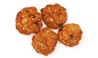 Homemade oat cookies with raisins, isolated on white background.