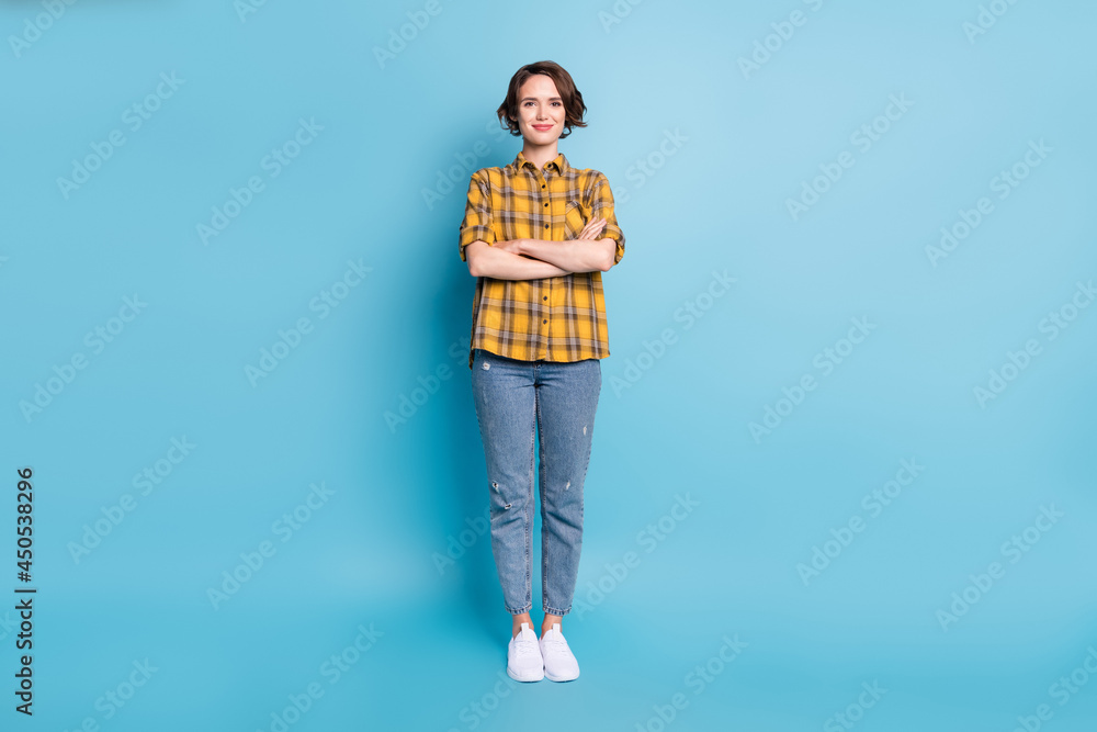 Sticker photo of self-assured business lady folded hands wear plaid shirt jeans sneakers isolated blue color