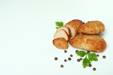 Concept of tasty food with cutlets on white background