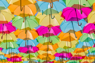 Fototapeta na wymiar Colorful umbrellas for happy mood