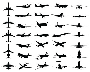 Black silhouettes of different aircrafts on a white background	