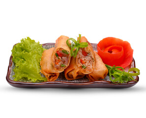 Spring Rolls on traditional Chinese serving dish  .