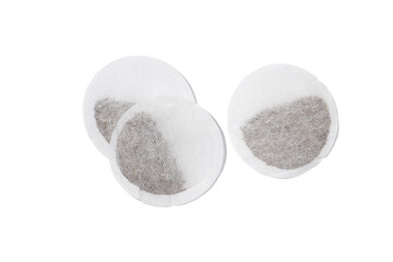 Top view of three round tea bags isolated on white background