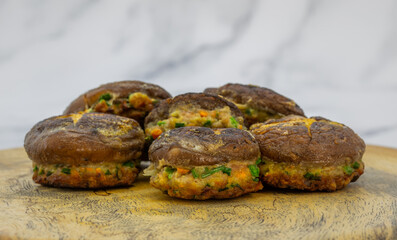 Korean food Pyogobeoseot-Jeon which is fried Shiitake mushroom with meatball