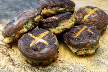 Korean food Pyogobeoseot-Jeon which is fried Shiitake mushroom with meatball