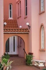 Fototapeta na wymiar Detail of pink mediterranean style building.