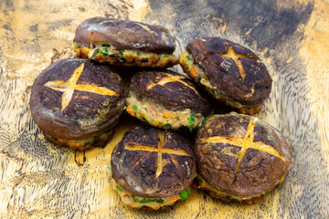 Korean food Pyogobeoseot-Jeon which is fried Shiitake mushroom with meatball