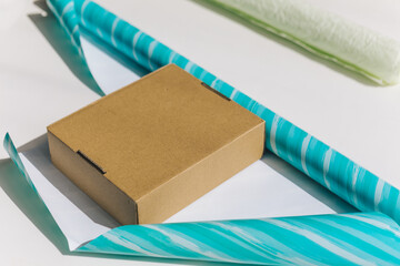 packing gift box with wrapping paper