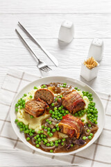 english meatballs, faggots with potatoes and peas