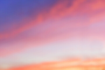 Beautiful colorful sunrise blur sky background and soft cloud. Natural background concept and abstract idea