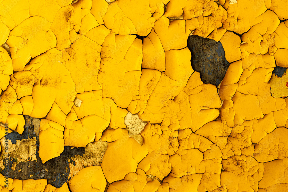 Poster concrete wall with yellow paint in cracks. background for design. grunge texture
