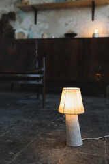 Stylish burning night lamp on table indoors. Light electric for interior home.