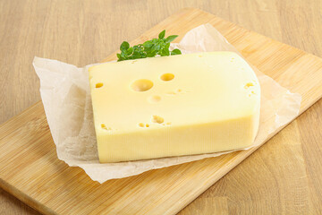 Maasdam cheese over the board