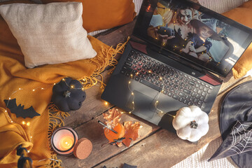 Halloween online virtual holiday remote celebration halloween in lockdown home quarantine covid 19 new normal, social distance, remote communication,stay home vocation halloween selective focus
