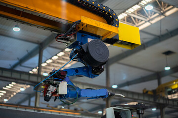 robot arm working in factory