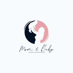 Obraz premium Mom and baby logo design vector
