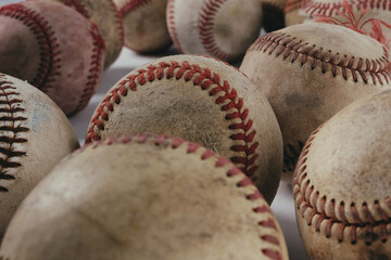 Old vintage texture of used baseballs for sports game equipment background pattern.