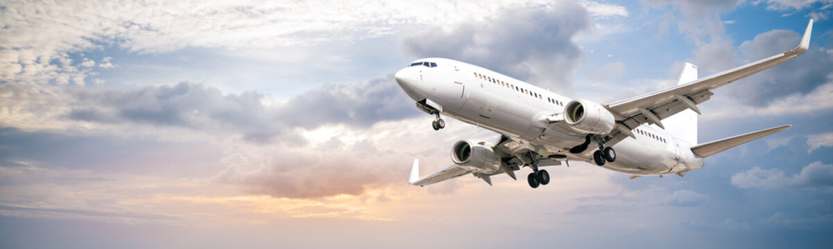 modern airliner against a cloudy sky