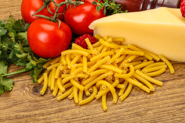 Italian pasta raw Maccheroni for cooking
