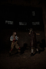 Obraz premium Stalker woman fighting a monster