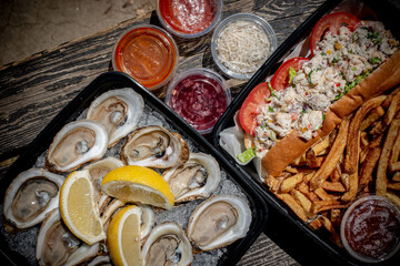 oysters and lobster rolls french fries