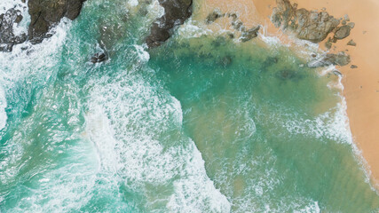 Aerial drone photo waves breaking to rock,no body.Beautiful  waves crashing on the rocks Coast islands.