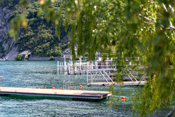 View of the boat dock and the swimming path on Lake Como