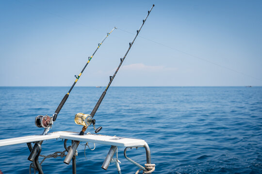 Seascape,Fishing reels and rods reels.big game fishing reel in natural setting.