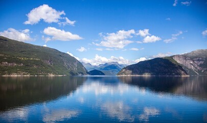 Fototapeta na wymiar Sunny blue fjord in Norway