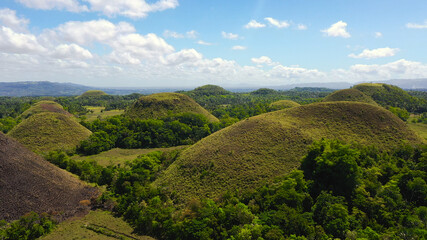 Amazingly shaped Chocolate hills on sunny day on Bohol island, Philippines.