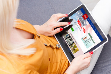 woman with laptop United States Permanent Resident Card