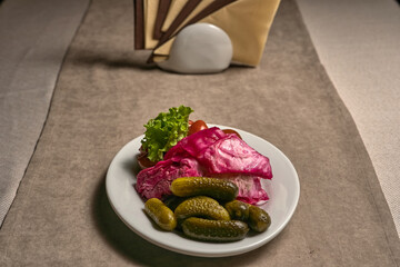 Assorted pickled cucumbers, tomatoes and cabbage