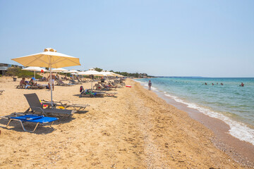 Amazing beauty white sand beach of Greece. Turquoise sea water and blue sky. Beautiful background. Greece.