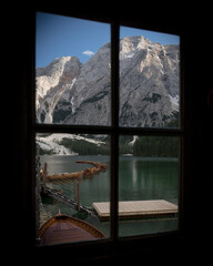 view through the window on the alps lake lago di braies 