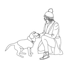 young girl in glasses with cheeks in a coat, hat, mittens, scarf, jeans and sneakers. Casual style for fall or spring for cold weather.Girl walking in cold weather with a dog in clothes