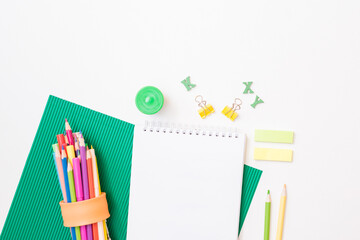 Flat lay school and office supplies on a white background