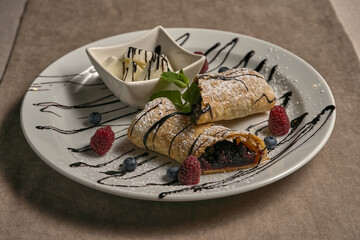 Cherry strudel with ice cream
